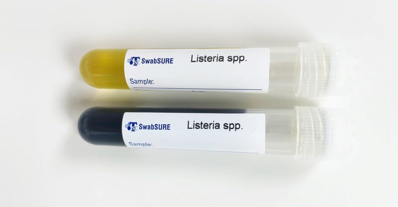 A positive and Negative sample of the SwabSURE Listeria swabs. Rapid colour change results.